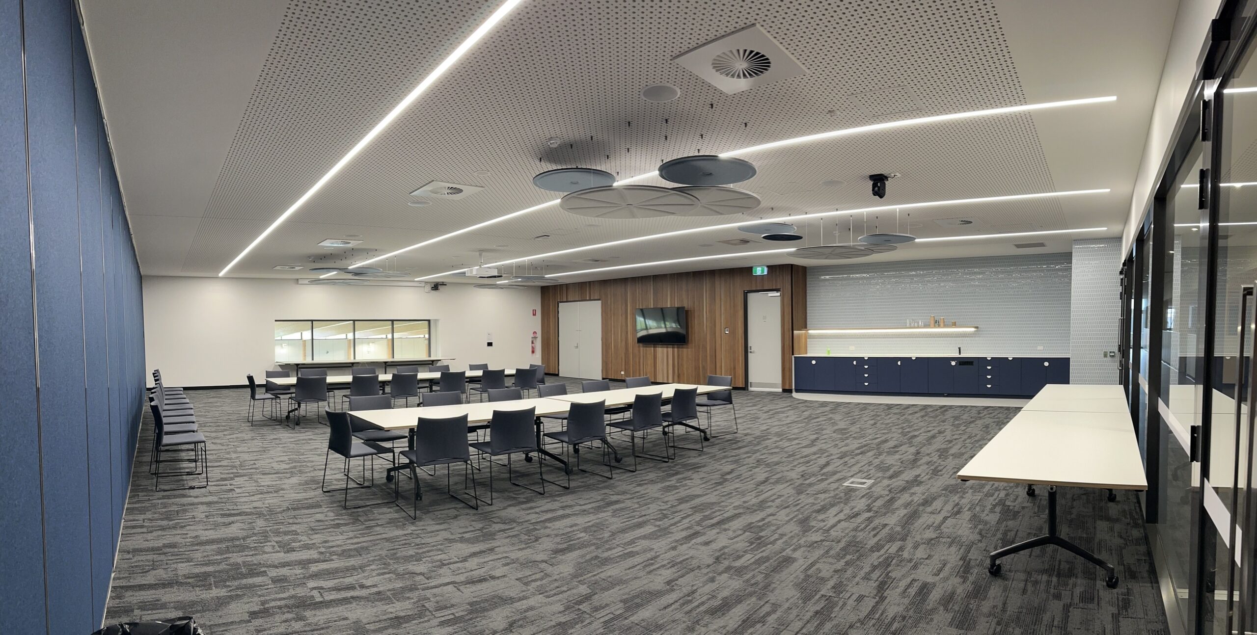 Function Room with windo at the back and board room seating with tea and coffee station on right hand wall