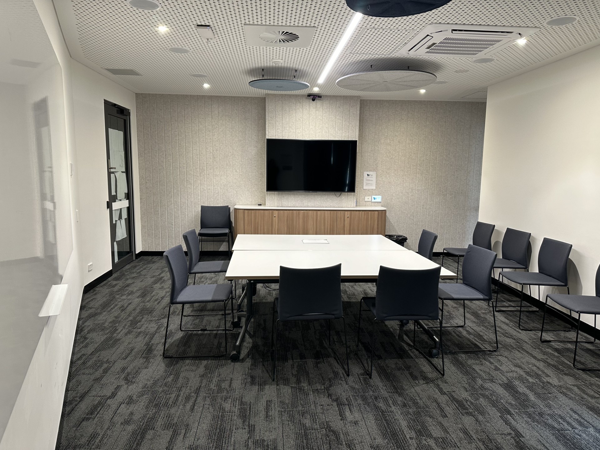 Meeting Room with television and boardroom seating